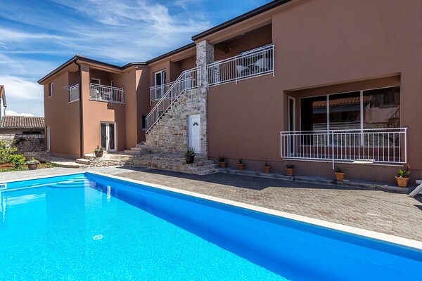 Apartment Complex with Common Pool in Tar-Torre / One-Bedroom Modern Apartment Noa I in Villa Valtrazza