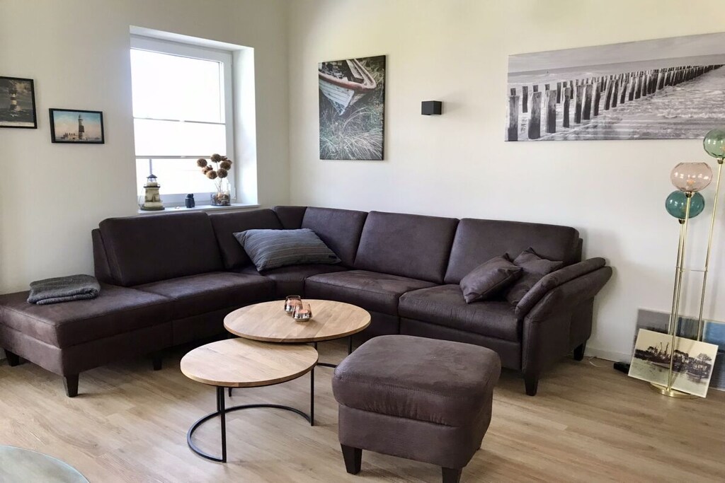 Ankerherz is a new semi-detached house at the end of the “Am Kutterhafen†settlement
Because the house is connected to our own property, Ankerherz has the great advantage that the path to the harbor is only a stone's throw away, meaning the harbor is only 50 meters away.
Ankerherz has been rented since April 2022.
The house has 3 bedrooms, 2 bathrooms, a sauna, a kitchen and a large living and dining area with a fireplace. The bedroom on the ground floor has a large double bed, there is also a spacious walk-in shower room and a storage room with a washing machine.
The two bedrooms on the upper floor have a double bed and 2 single beds.
The bathroom up here has a walk-in shower, bathtub and a sauna.
There is a very spacious and cozy living and dining area.
You will find satellite TV in all bedrooms and in the living area. The house has a fiber optic connection and all televisions are connected to the Internet.
The kitchen is fully equipped.
Generous parking spaces for 3 cars, use of the “wallbox†right in front of the front door
Storage space for bicycles, strollers, etc.
Covered terrace with summer seating and grill
The house has fly and mosquito protection in all bedrooms, bathrooms and patio doors.