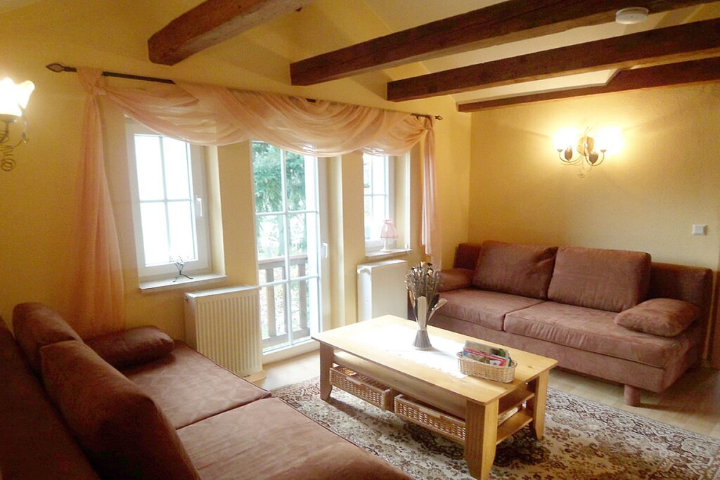 Ground floor: (Living room(single sofa bed, TV, radio, heating), Kitchen(stove, hob, electric kettle, toaster, coffee machine, oven, dishwasher, fridge, freezer, heating), bedroom(cot), bedroom(cot), bedroom(cot), bathroom(shower, sauna, washbasin, toilet, heating, hairdryer, Towels incl.))\n\nfireplace, terrace, garden, garden furniture, parasol, table tennis table