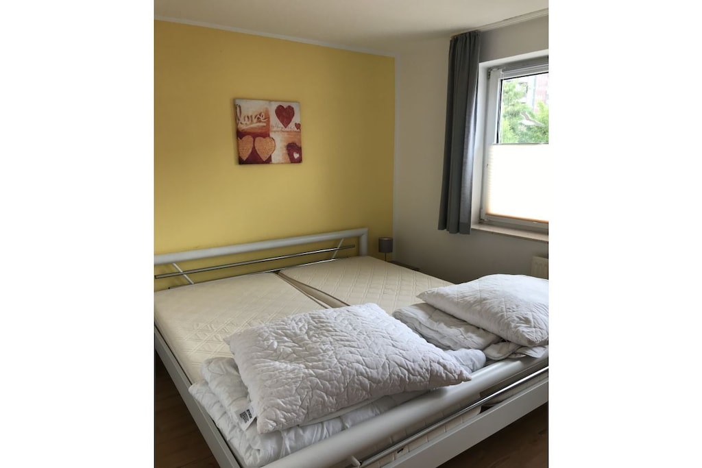 On the 1st floor: (Living room(single sofa bed, TV, dining table, radio, high chair), Kitchen(stove, hob, electric kettle, toaster, coffee machine, oven, microwave, dishwasher, fridge), bedroom(single bed, double bed), bedroom(double bed, double bed), bathroom(shower, washbasin, toilet))\n\nbalcony, garden furniture, parking, parasol, iron