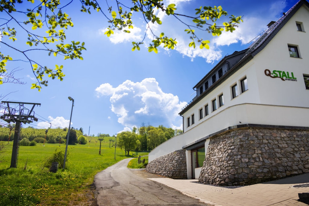 Ground floor: (relaxation area(sauna))\n\nHot Water, Internet Access DSL, open kitchen(Tea Towels, Kitchenette, double sofa bed, TV, dining table, hob, electric kettle, coffee machine, oven, dishwasher, fridge, freezer, dishes and cutlery), bedroom(Bed Linen, Wardrobe, double bed, TV), bathroom(Mirror, toilet, shower, washbasin), Internet access, tumble dryer, washing machine, parking, ironing board, drying cabinet