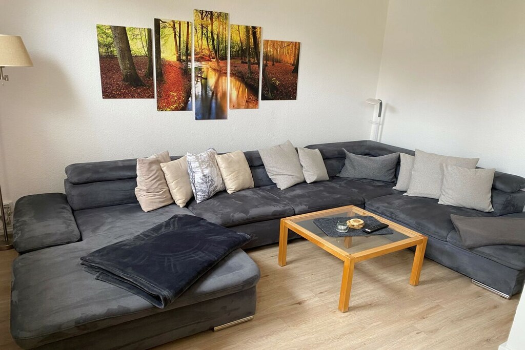 Cozy modern holiday apartment for 6 people + baby with a terrace close to the center in Wernigerode with a view of the castle from the living room.