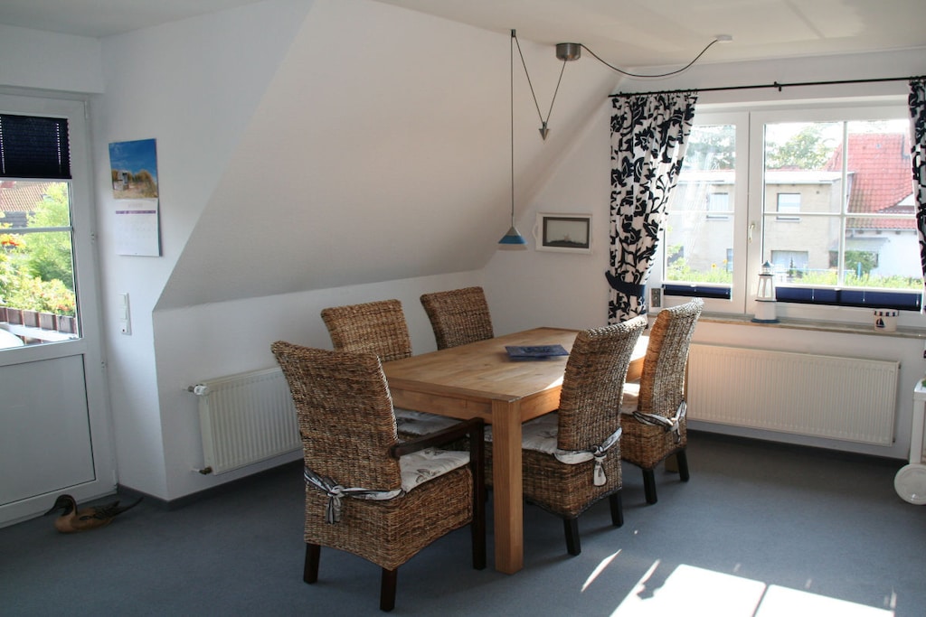 On the 1st floor: (Living room(Armchair, TV))\n\nHot Water, Vacuum Cleaner, Kitchen, bedroom(double bed), bedroom(double bed), bathroom(Egg Cooker, Mirror, Spices, Tea Towels, Kitchenette, toilet, stove, electric kettle, toaster, cooker, coffee machine, oven, microwave, dishwasher, fridge, freezer, freezer, bath tub, shower, washbasin), First Aid, washing machine, balcony(Sun Umbrella, garden furniture, awning), parking, iron, drying cabinet