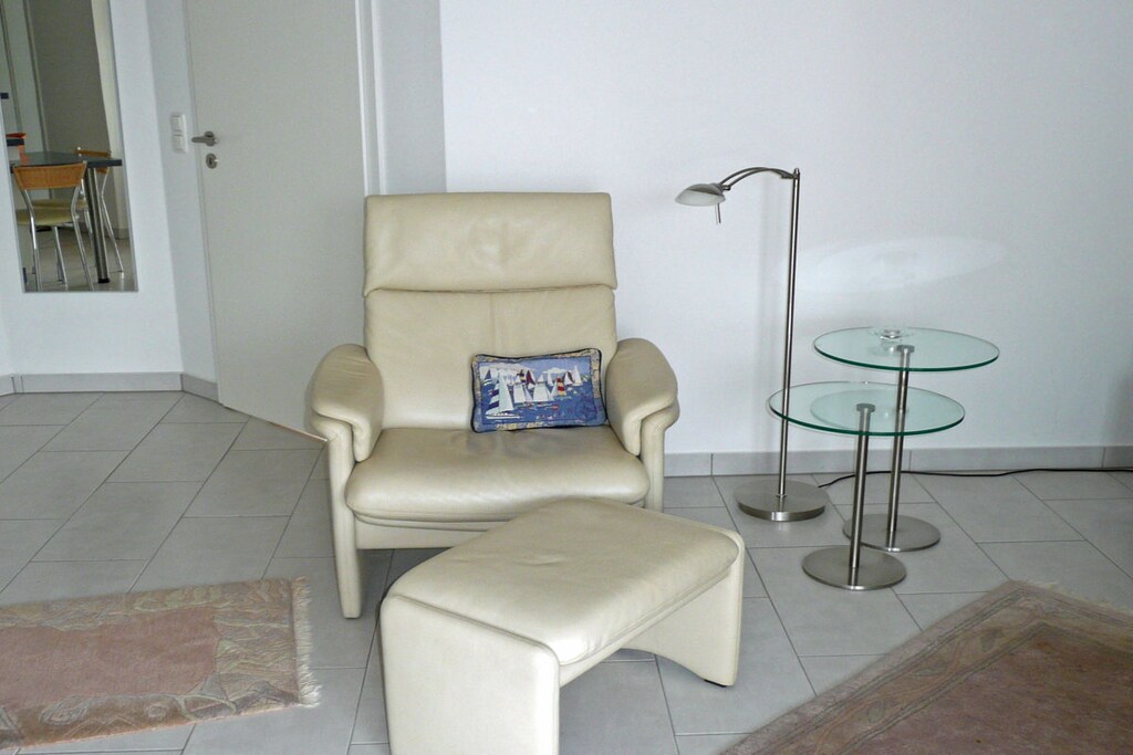 On the 1st floor: (hallway(Mirror, Wardrobe Coatrack), Kitchen(stove, hob, electric kettle, toaster, coffee machine, microwave, dishwasher, fridge, freezer), Living/diningroom(Armchair, Games, Sofa, library, TV, DVD player, radio), bedroom(Mirror, Wardrobe, double bed), bedroom(Desk, Wardrobe, single sofa bed, TV), bathroom(Make Up Mirror, Mirror, toilet, shower, washbasin, hairdryer))\n\nHot Water, Safe, Vacuum Cleaner, Internet access, First Aid, tumble dryer, washing machine, balcony(garden furniture), heating, parking, ironing board, drying cabinet