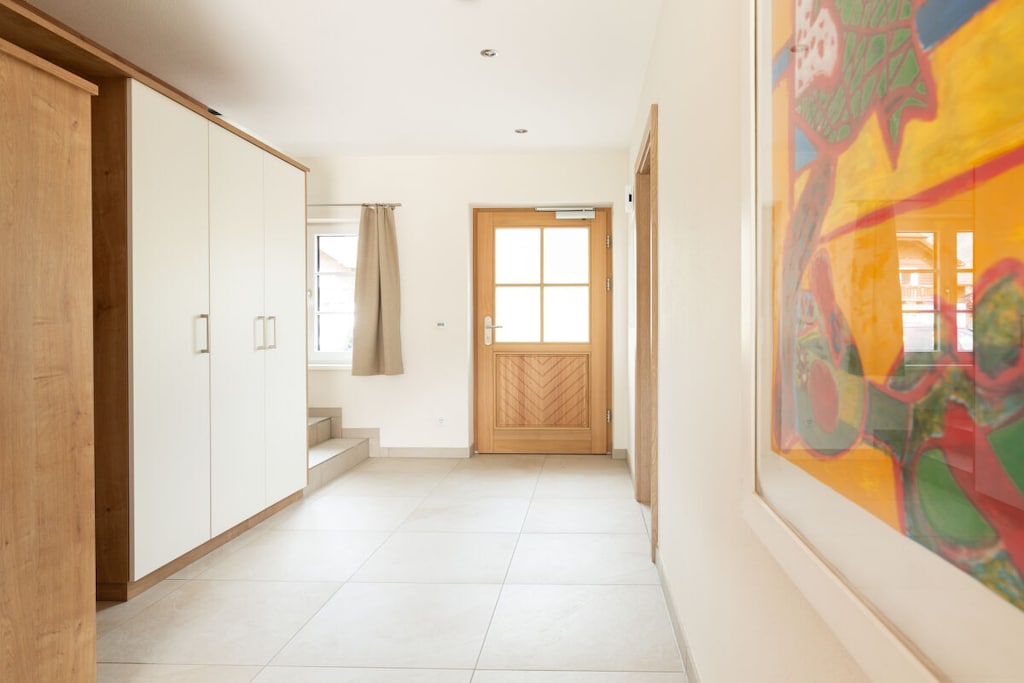 Ground floor: (hallway, Living room(TV, dining table), Kitchen(stove, hob, electric kettle, coffee machine, oven, grill, dishwasher, fridge, freezer, high chair), bathroom(shower, washbasin, toilet, Towels incl.))\n\nOn the 1st floor: (bedroom(double bed, TV), bedroom(double bed, TV), bedroom(double bed, TV), bathroom(bath tub, shower, washbasin, toilet, Towels incl.))\n\nterrace, garden, garden furniture, parking, parasol