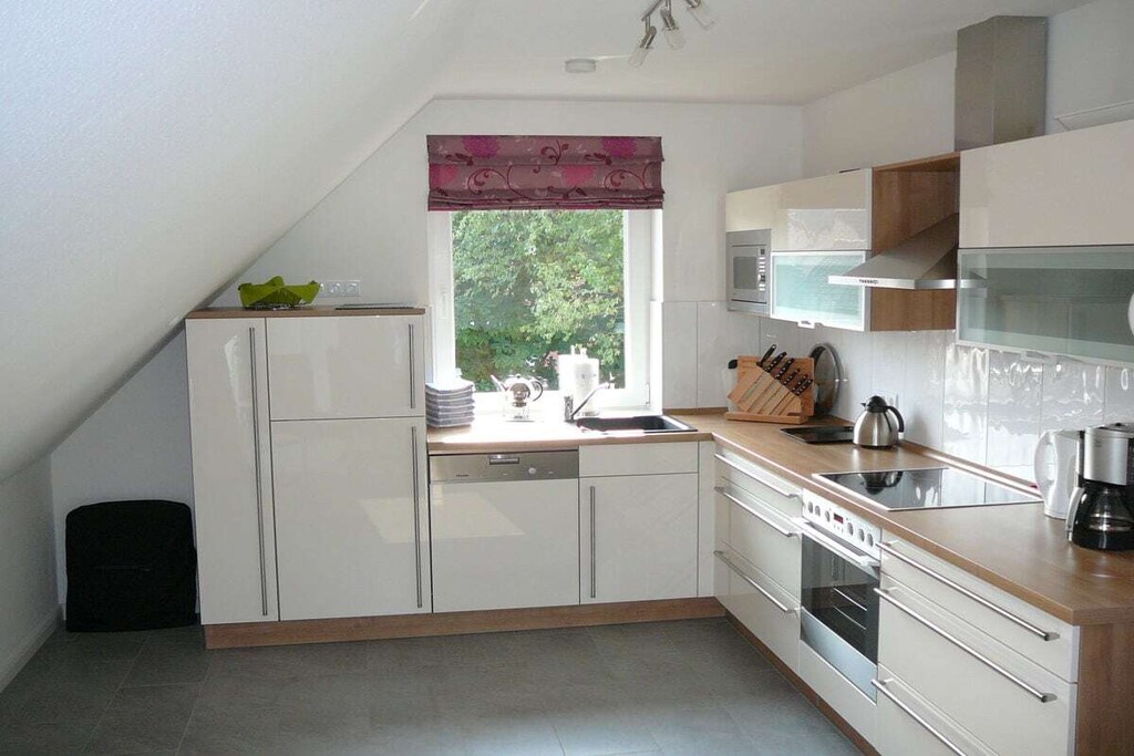 Uniquely central and yet surrounded by greenery! The holiday apartment has exclusive furnishings and a roof terrace.