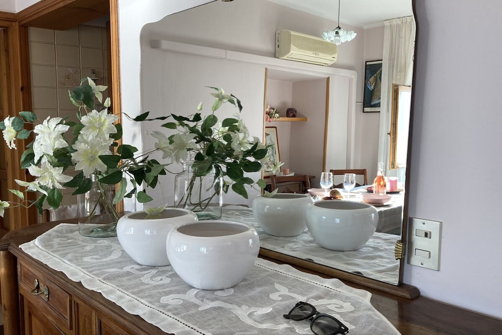 Romantic holiday apartment Casa Oliva with wonderful lake view, beautiful terrace and olive garden.