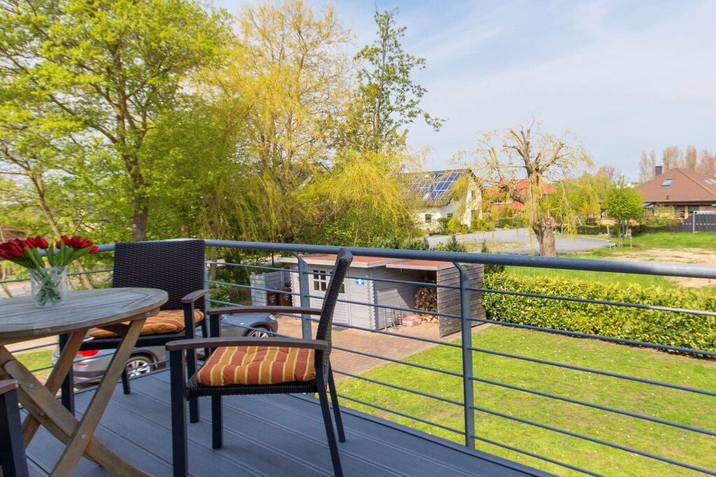 Attic: (Kitchen(microwave), Living/diningroom(Sofa, TV, dining table, fireplace, heating), bedroom(Wardrobe, double bed, double bed, heating), bedroom(Wardrobe, double bed, double bed, heating), bathroom(toilet, bath tub, shower, washbasin, heating), bathroom(toilet, bath tub, shower, washbasin, heating))\n\nHot Water, Vacuum Cleaner, Internet access, tumble dryer, washing machine, balcony(garden furniture), heating, terrace(Sun Umbrella, Beach, grill, garden furniture), ironing board, iron, drying cabinet, Laundry Package for a fee, parking (paying)