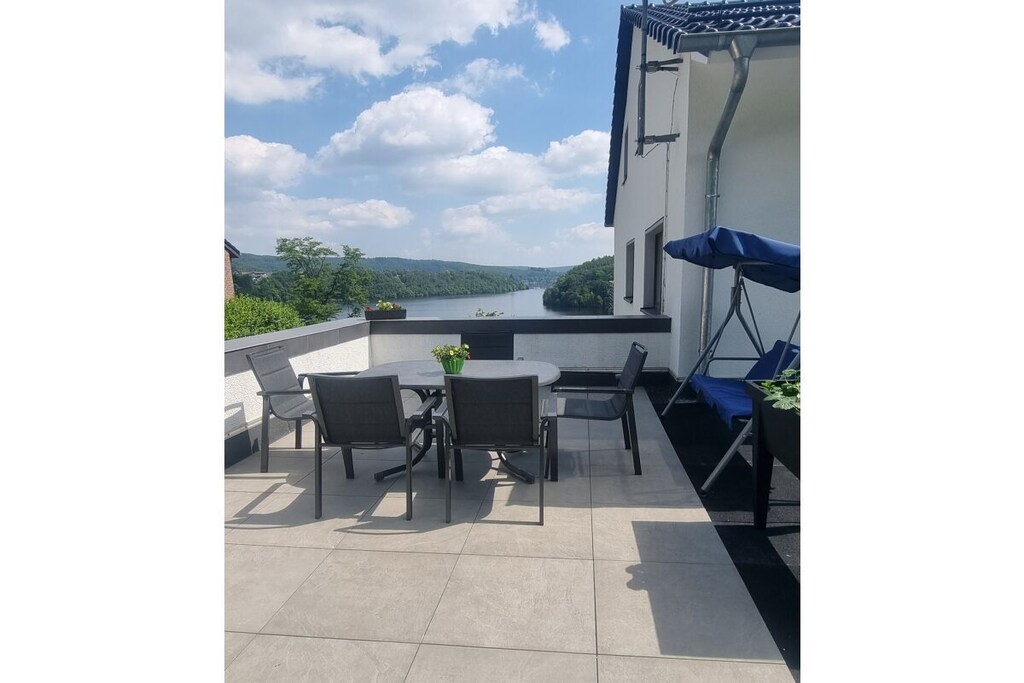 New and modern: Spend your holiday directly on the lake in the newly built Seerandweg holiday apartment in the idyllic village of Rurberg!