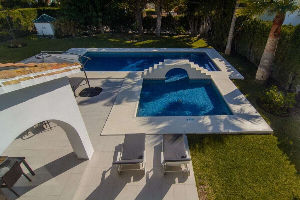 Garden with pool on the beach