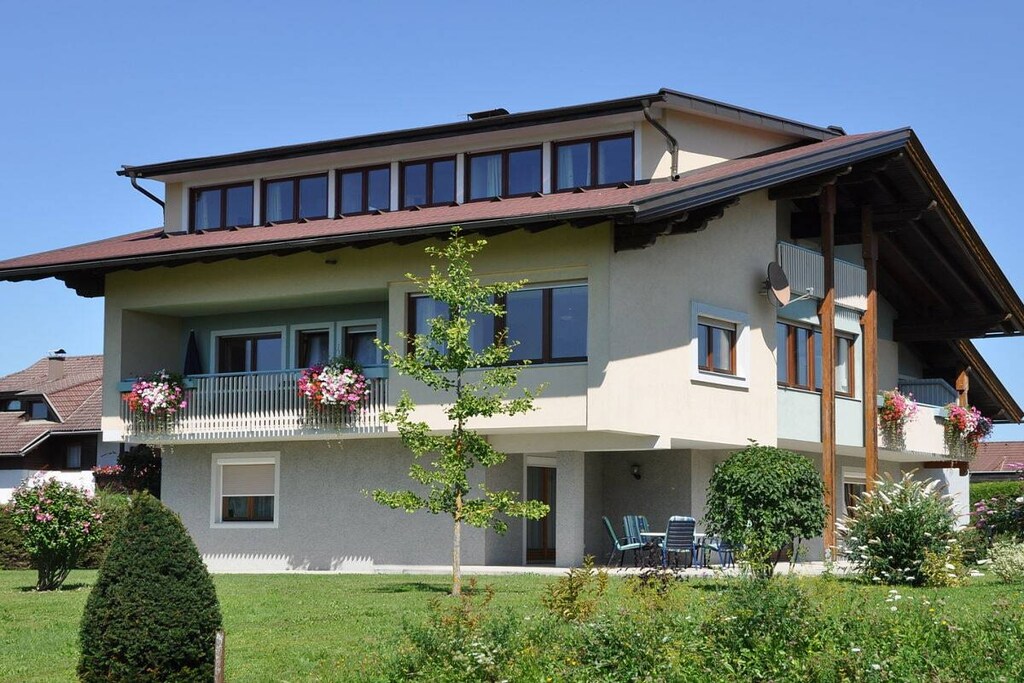Holiday for your family at Lake Faak in Carinthia in a newly renovated & modern holiday apartment with 65mÂ² & private beach, children's playground...