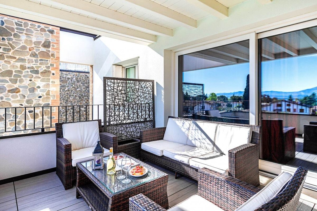 Ground floor: (Living room(single sofa bed, TV, dining table), Kitchen(hob, electric kettle, toaster, coffee machine, microwave, fridge, freezer, dishes and cutlery), bedroom(double bed), bedroom(double bed), bathroom(shower, washbasin))\n\nHot Water, relaxation area(swimming pool), Internet access, Internet access, washing machine, terrace(garden furniture), ironing board, iron