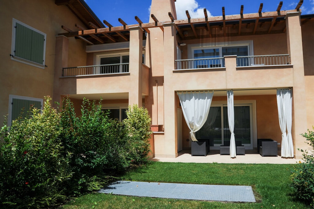 Ground floor: (Living room(double sofa bed, TV), Kitchen(electric kettle, toaster, coffee machine, oven, microwave, dishwasher, fridge, freezer, dishes and cutlery), bedroom(double bed), bedroom(bunk bed), bathroom(shower, hairdryer))\n\nInternet access, Internet access, washing machine, terrace, garden(garden furniture, sun loungers, swimming pool), iron