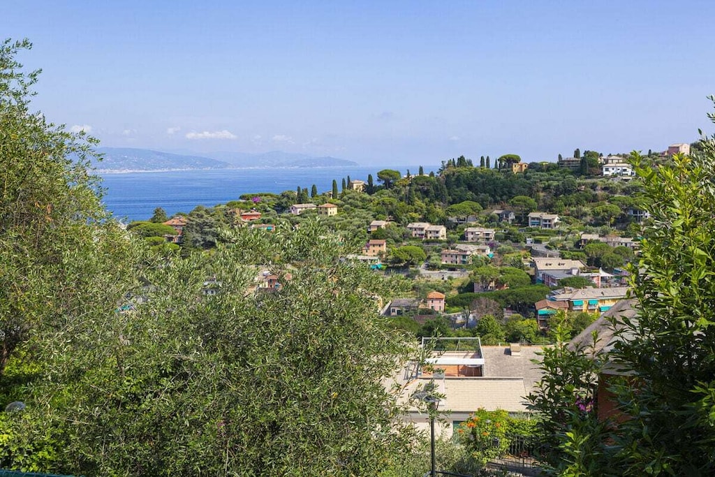 The apartment is located in a quiet residential area, surrounded by nature and with a beautiful sea view. Access is via a staircase of about 30 steps: it leads directly into the living room with kitchenette, then there is a small laundry room, a double bedroom and bathroom with shower, a bedroom with two single beds and the second bathroom.

A splendid panoramic terrace with sea view and a garden with fruit trees (both for exclusive use) complete the apartment.

Opposite the building there is a bus stop and below the house our guests can use a private garage.

Together for a safe holiday.

This year safety is our top priority and to guarantee your well-being we have created WITH, Wonderful Italy for Travel Health, our operational plan for the health of our guests and employees. We want everyone who comes into contact with Wonderful Italy to do so safely. In our homes you will experience a cozy, relaxing holiday.