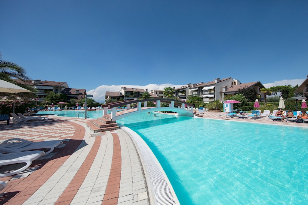 Ground floor: (Living room(single sofa bed, TV), Kitchen(stove, electric kettle, toaster, oven, microwave, dishwasher, fridge, freezer, Food processor, dishes and cutlery), bedroom(double bed), bathroom(shower))\n\ngarden, garden furniture, sun loungers, swimming pool