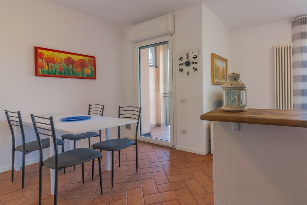 Ground floor: (Living room(TV), Kitchen(dining table, stove, electric kettle, toaster, oven, microwave, dishwasher, fridge, freezer, Food processor), bedroom(double bed), bedroom(single bed), bathroom(shower, washbasin, toilet, bidet, Towels incl.))\n\nHot Water, Internet access, tumble dryer, washing machine, balcony(balcony), parking, iron