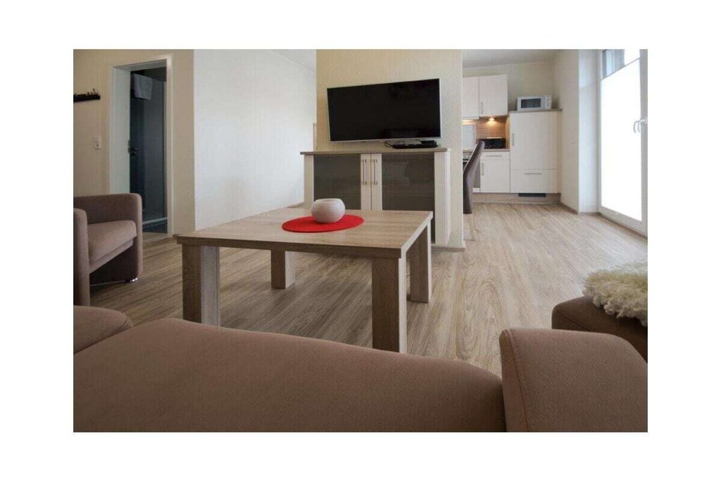 Ground floor: (Living room(TV, radio, heating), Kitchen(hob, electric kettle, toaster, cooker, coffee machine, oven, microwave, dishwasher, fridge, freezer), bedroom(Wardrobe, double bed, children\'s bed), bathroom(shower, washbasin, hairdryer))\n\nInternet Access DSL, Vacuum Cleaner, hallway(Wardrobe Coatrack), storage, Internet access, Internet access, tumble dryer, washing machine, terrace, garden(Lawn, garden furniture), iron, drying cabinet, parking (paying)