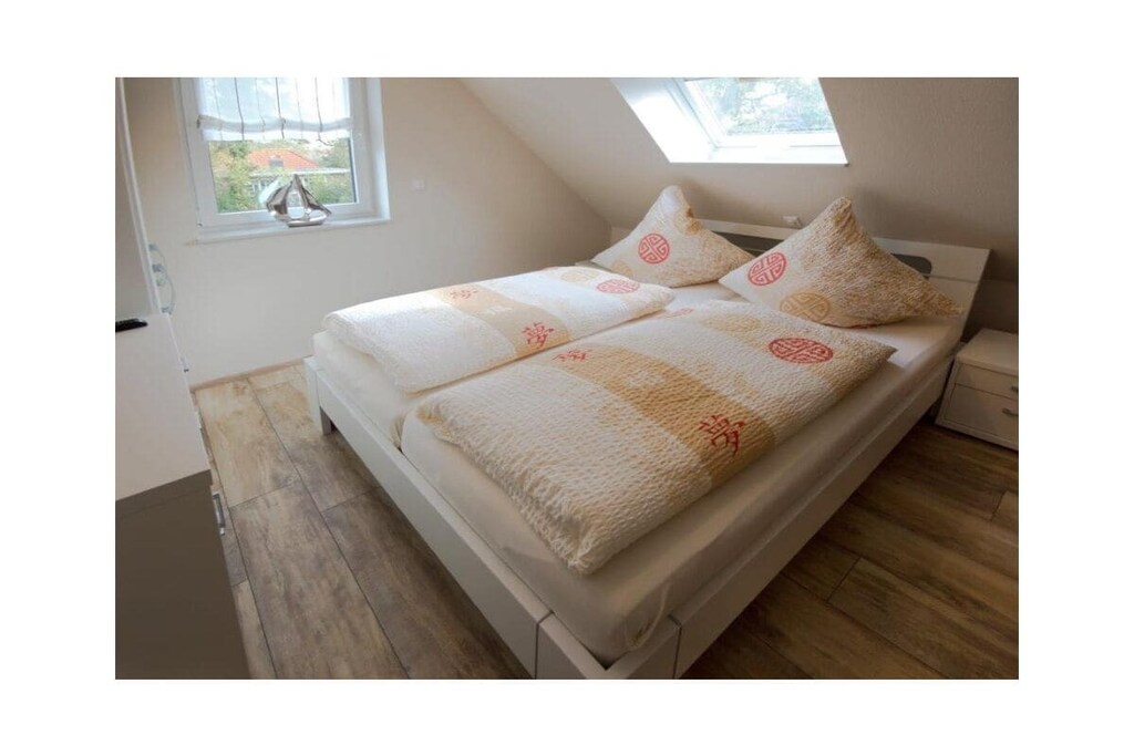 On the 1st floor: (Living room(TV, CD player, heating), Kitchen(hob, electric kettle, toaster, coffee machine, oven, microwave, dishwasher, fridge, freezer, high chair), bedroom(double bed, children\'s bed), bedroom(double bed, children\'s bed))\n\nAttic: (bedroom(double bed), guest toilet)\n\nInternet Access DSL, Vacuum Cleaner, hallway(Wardrobe Coatrack), storage, Internet access, Internet access, tumble dryer, washing machine, balcony(balcony), garden furniture, iron, drying cabinet, parking (paying)