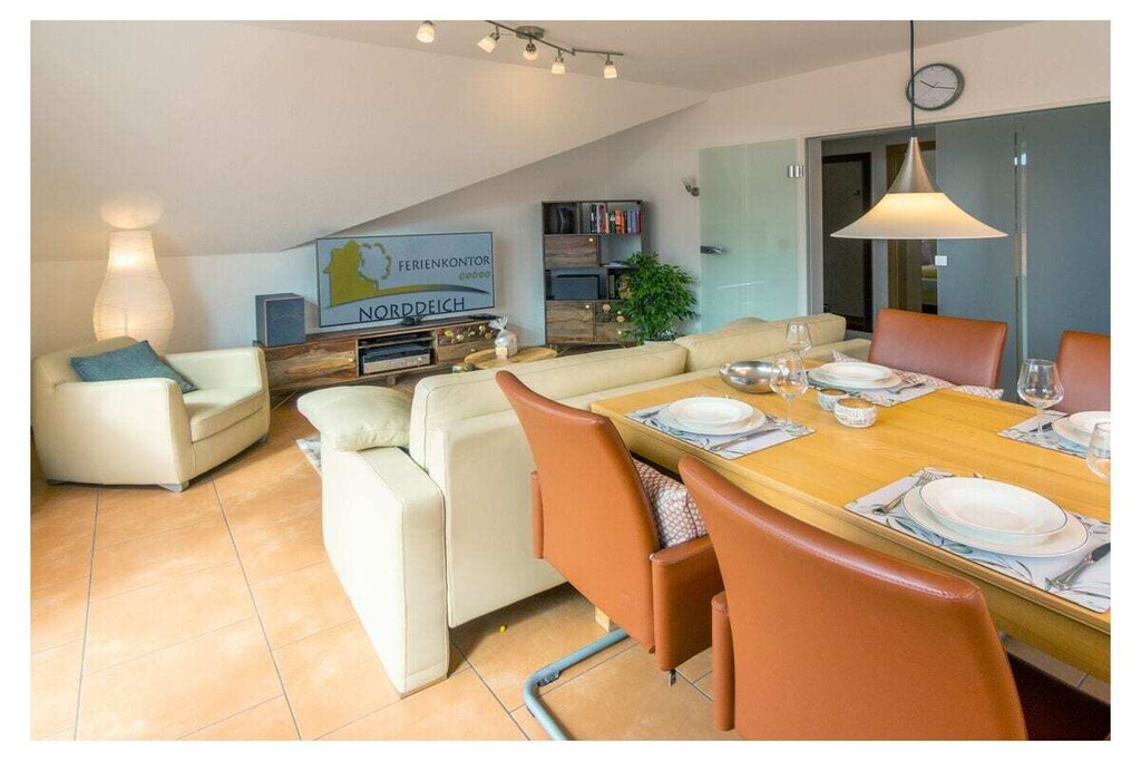 Ground floor: (hallway, Living room(TV, DVD player, radio), Kitchen(hob, electric kettle, toaster, coffee machine, oven, microwave, dishwasher, fridge, high chair), bedroom(double bed, children\'s bed), bedroom(double bed, children\'s bed), bathroom(shower, toilet, hairdryer))\n\nbalcony