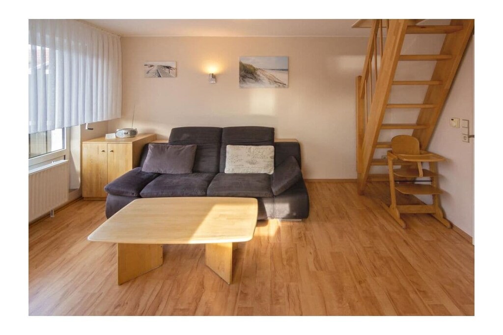 Ground floor: (hallway, Living room(TV, DVD player, radio), Kitchen(hob, electric kettle, toaster, cooker, coffee machine, oven, fridge, freezer, high chair, dishes and cutlery), bedroom(double bed, children\'s bed, insect screens), bedroom(double bed, children\'s bed, insect screens), bathroom(shower, toilet, hairdryer))\n\nbalcony