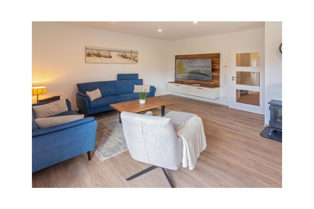 Ground floor: (hallway, Living room(TV, radio, heating), Kitchen(hob, electric kettle, coffee machine, oven, microwave, dishwasher, fridge, freezer), bedroom(double bed), bedroom(children\'s bed), bathroom(shower, toilet, hairdryer), bathroom(shower, toilet, hairdryer))\n\ngrill, washing machine, garden furniture, parking, iron