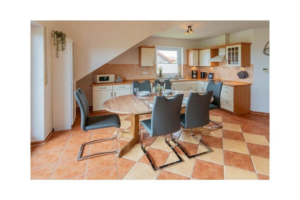 Ground floor: (hallway, Living room(TV, heating), Kitchen(hob, electric kettle, toaster, coffee machine, oven, dishwasher, fridge, freezer), bedroom(double bed), bedroom(children\'s bed), bedroom(double bed), bathroom(shower, toilet, hairdryer))\n\nwashing machine, balcony, garden furniture, parking