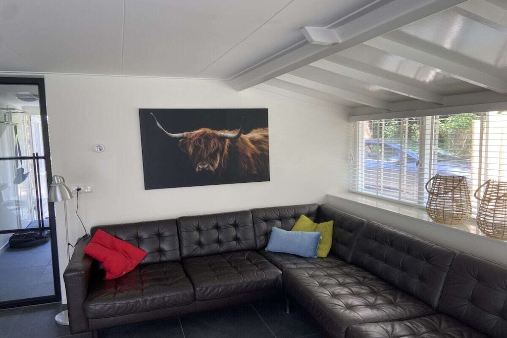 Hot Water, Vacuum Cleaner, Living room(Sofa, TV, DVD player, radio, CD player, heating), Kitchen(dining table, stove, electric kettle, toaster, coffee machine, oven, microwave, dishwasher, fridge, freezer), bedroom(Wardrobe, single bed, single bed), bedroom(Wardrobe, single bed, single bed), bedroom(single bed), bathroom(shower, washbasin, washing machine), guest toilet(toilet, washbasin), Internet access, Internet access, washing machine, heating, terrace, garden(Sun Umbrella, grill, garden furniture, sun loungers), parking, drying cabinet