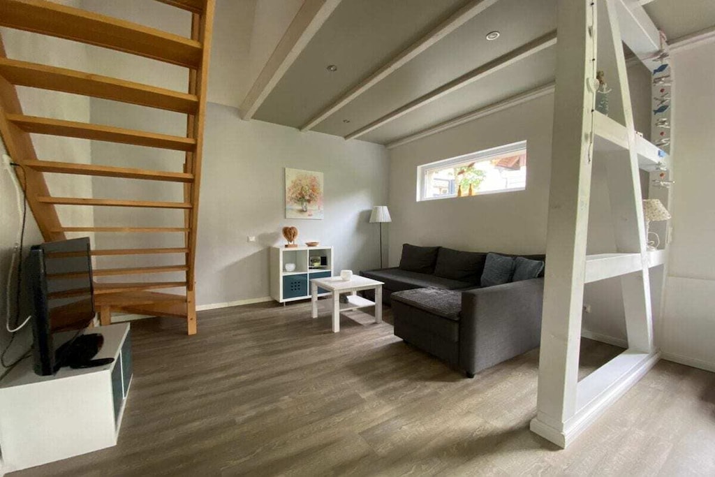 Ground floor: (Living/diningroom(Sofa, TV, TV, dining table, heating), bathroom(Mirror, toilet, shower, washbasin, heating))\n\nOn the 1st floor: (bedroom(Bed Linen, Wardrobe, single bed, single bed, double bed, cot), bedroom(Bed Linen, Wardrobe, single bed, single bed, double bed, cot))\n\nHot Water, Internet Access DSL, Vacuum Cleaner, Internet access, Internet access, First Aid, heating, terrace(garden furniture), garden(Barbecue center, Lawn, garden furniture, Garden shed), parking, drying cabinet