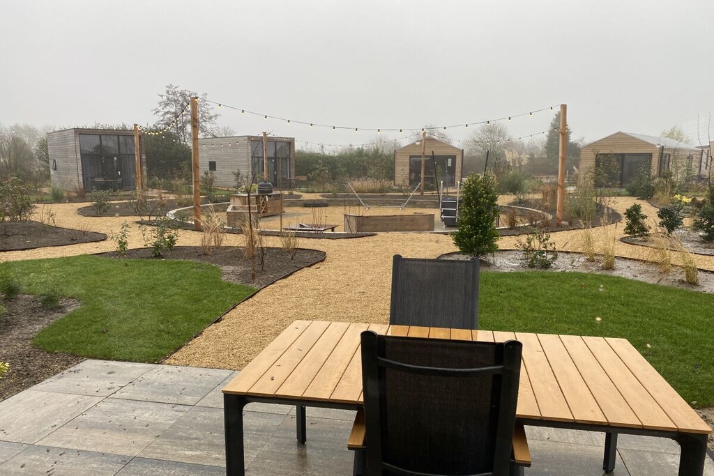 Ground floor: (Living/diningroom(Sofa, TV, dining table, stove), bedroom(Wardrobe, double bed, TV, radio), bathroom(Mirror, shower, washbasin), guest toilet(Mirror, toilet, washbasin), relaxation area(sauna))\n\nFire Alarm, Hot Water, Internet Access DSL, Internet Access ISDN, Vacuum Cleaner, Internet access, Internet access, heating, terrace(Sun Umbrella, garden furniture, sun loungers), terrace(Sun Umbrella, garden furniture, sun loungers), parking, drying cabinet, Charging post for electric cars