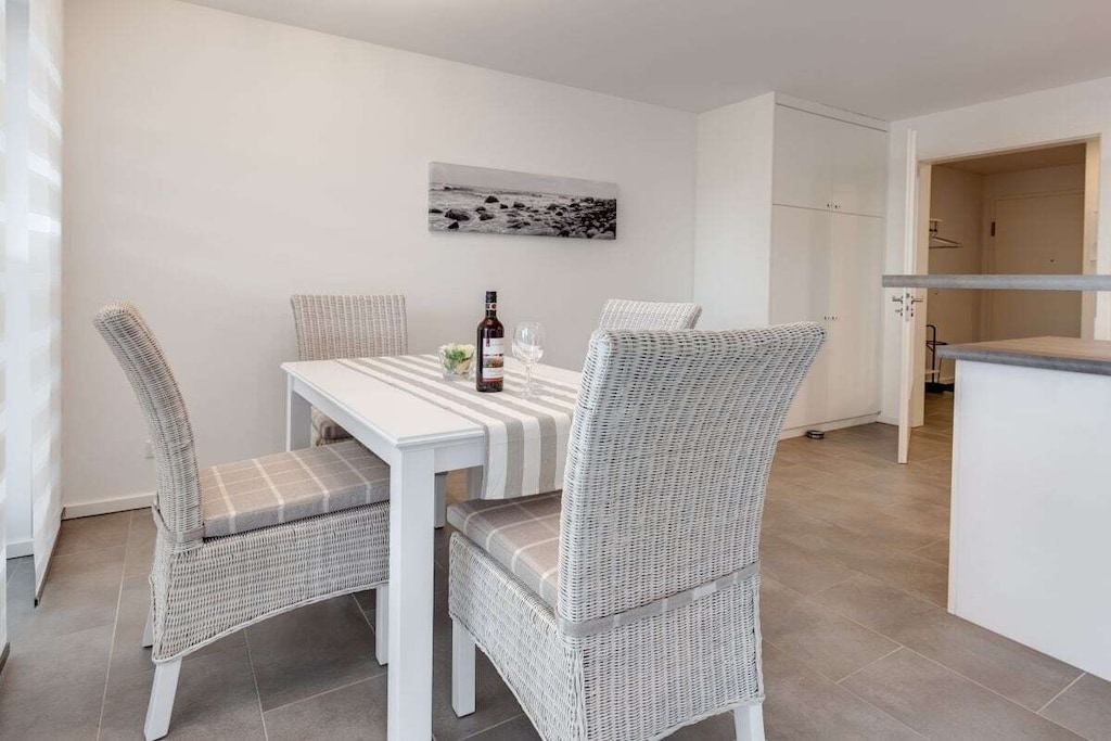 Ground floor: (Kitchen(stove, electric kettle, oven, washbasin), Living/diningroom(double sofa bed, TV, dining table, heating), bedroom(double bed), bedroom(double bed), bathroom(shower, washbasin, toilet, heating))\n\nHot Water, Internet Access DSL, Vacuum Cleaner, guest toilet(Mirror, toilet, washbasin, heating), Internet access, Internet access, tumble dryer, washing machine, heating, ironing board, iron