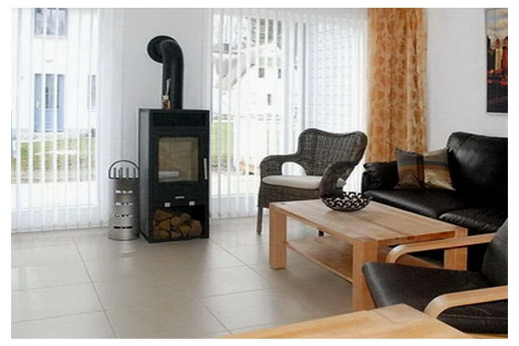 Ground floor: (Kitchen(stove, hob, oven, dishwasher, fridge, heating), Living/bed room(Armchair, Sofa, double sofa bed, TV(digital), fireplace, heating), bathroom(Mirror, toilet, shower, washbasin, heating), storage(Vacuum Cleaner, tumble dryer, washing machine, ironing board, iron, drying cabinet))\n\nOn the 1st floor: (bedroom(Wardrobe, double bed, TV(antenna)), bedroom(single bed, single bed), bathroom(Mirror, toilet, bath tub, washbasin, heating))\n\nFire Alarm, Hot Water, Vacuum Cleaner, Internet access, First Aid, tumble dryer, washing machine, heating(central), terrace(Sun Umbrella, garden furniture), parking, ironing board, iron, drying cabinet