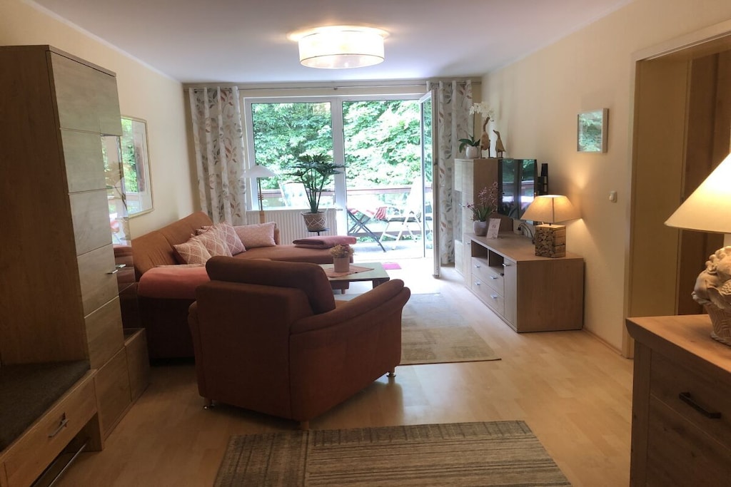 On the 3rd floor: (Living room(Armchair, TV), dining room(dining table), Kitchen(stove, hob, cooker, oven, dishwasher, fridge), bedroom(Bed Linen, Wardrobe, double bed, double bed), bedroom(Bed Linen, Wardrobe, double bed, double bed), bathroom(Mirror, toilet, shower, washbasin), bathroom(Mirror, toilet, shower, washbasin))\n\nElevator, Fire Alarm, Hot Water, Vacuum Cleaner, Internet access, First Aid, balcony(Sun Umbrella, balcony, sun loungers), drying cabinet