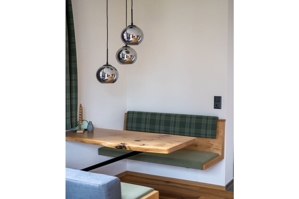 The holiday apartment consists of a cozy bedroom, a living room with a comfortable sofa bed, a fully equipped kitchen, and a modern bathroom. You can enjoy the fresh mountain air and relax on the balcony.