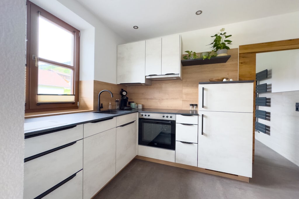 Living room(double sofa bed, TV, heating), Kitchen(stove, hob, oven, dishwasher, fridge, heating), bedroom(Bed Linen, Wardrobe, double bed, heating), bathroom(Mirror, toilet, shower, washbasin, heating), Internet access, balcony(balcony), parking