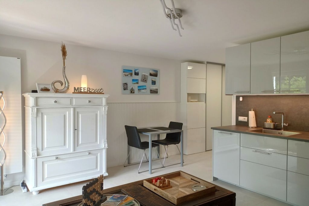 Fire Alarm, Hot Water, Vacuum Cleaner, hallway(Mirror, Wardrobe Coatrack), Kitchen(Mixer, Spices, hob, electric kettle, toaster, oven, microwave, dishwasher, fridge, freezer), Living/diningroom(Games, Sofa, TV, dining table, DVD player, DVD player, insect screens), bedroom(Wardrobe, library, double bed, insect screens), bathroom(Make Up Mirror, Mirror, toilet, shower, washbasin, hairdryer), Internet access, First Aid, heating, terrace(Sun Umbrella, garden furniture), parking, drying cabinet