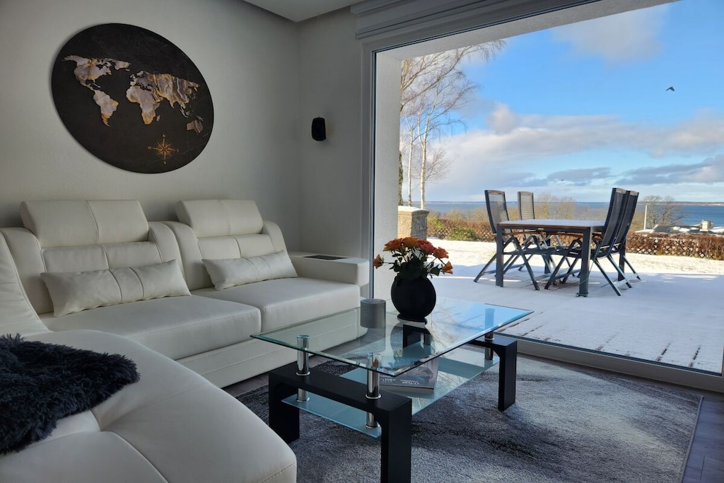 Ground floor: (Living room(Armchair, single sofa bed, TV, TV, fireplace, heating), Kitchen(Kitchenette, stove, hob, coffee machine, oven, microwave, dishwasher, fridge, heating), bedroom(Bed Linen, Wardrobe, double bed, TV, radio, heating, children\'s bed), bedroom(Bed Linen, Wardrobe, double bed, TV, radio, heating, children\'s bed), bathroom(Mirror, toilet, bath tub, shower, washbasin, heating, hairdryer), guest toilet(Mirror, toilet, washbasin, heating))\n\nHot Water, Internet Access DSL, Vacuum Cleaner, Internet access, Internet access, tumble dryer, washing machine, balcony, heating, garden(sauna, Barbecue center, Lawn, fireplace, garden furniture, sun loungers), parking, iron, Laundry Package for a fee