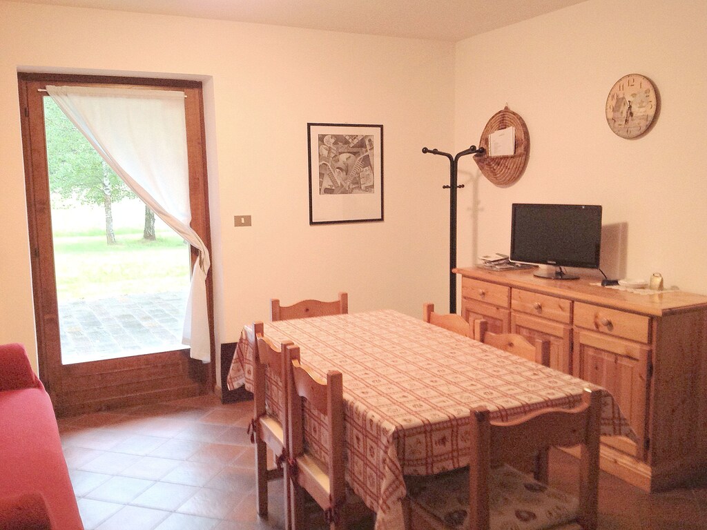 Heerlijk vakantiehuis in Pozza di Fassa met een tuin