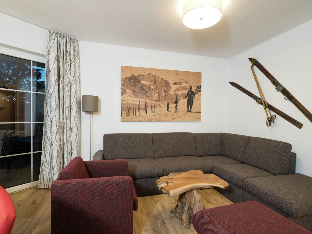 Ski-in-ski-out apartment in St. Johann with sauna