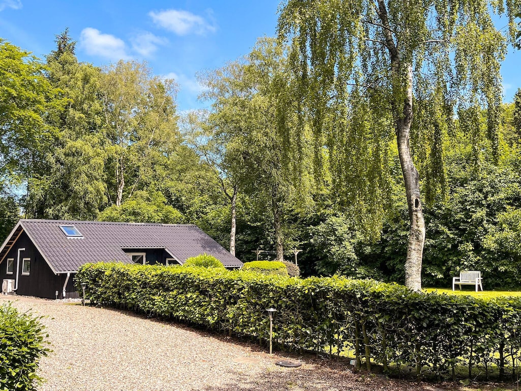 Familiehuisje met terras en gazon