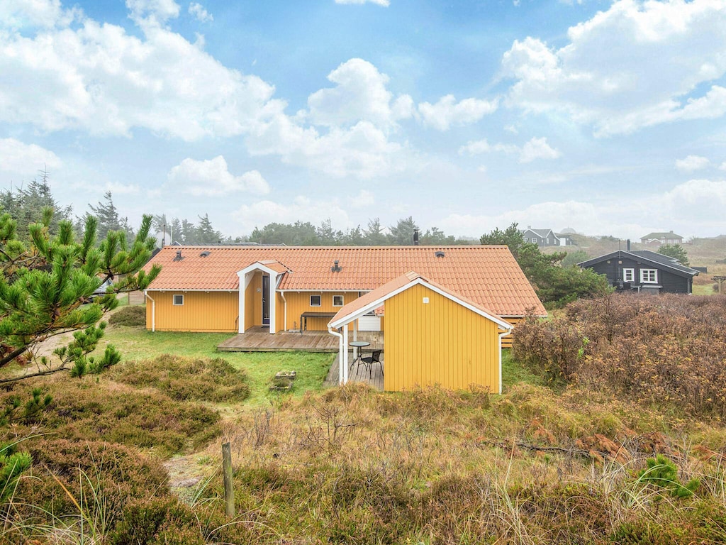 Licht strandhuis met sauna