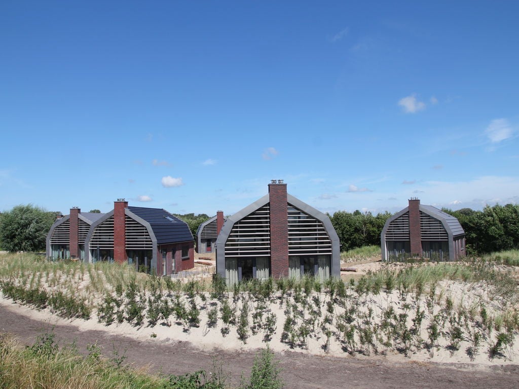 Nieuw park met prachtige duinvilla's omringd door duinreservaat en nabij zee