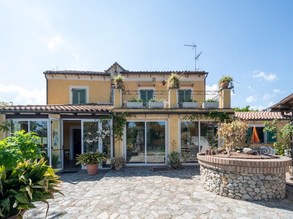 Vakantiewoning op landgoed, omgeven door citrus- en olijfbomen, 7km van zee.