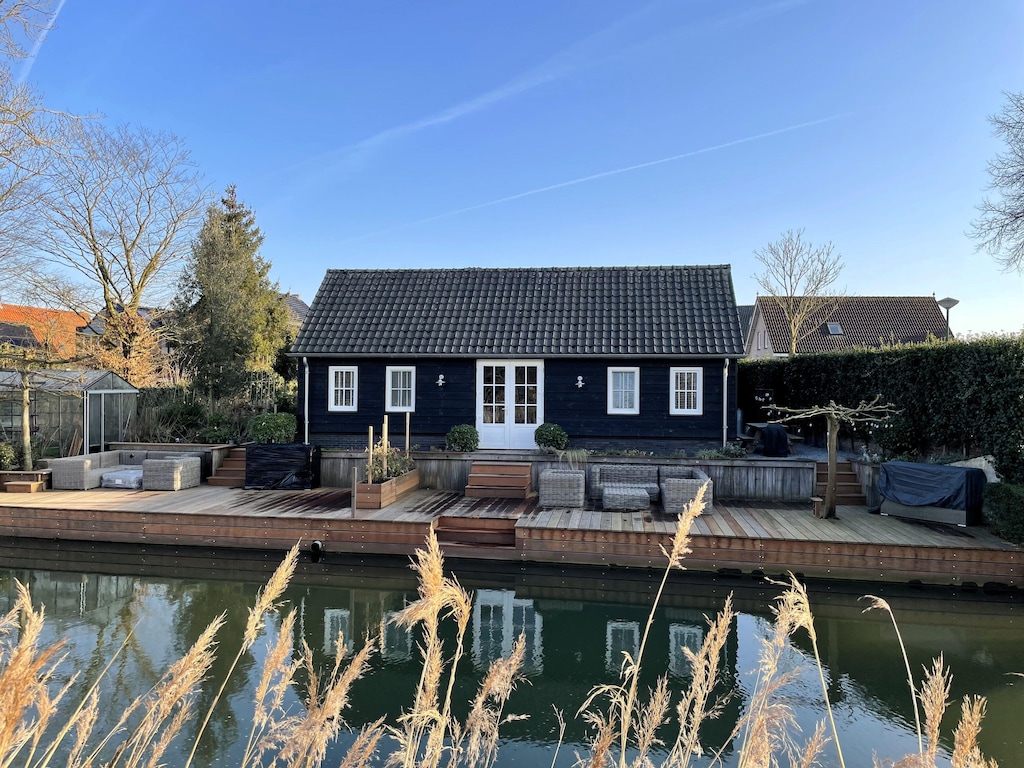 Prachtig chalet aan de rivier in Cothen