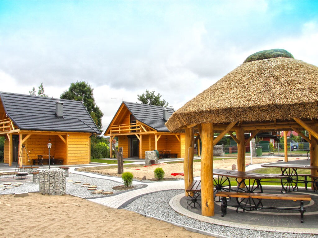 Een houten, milieuvriendelijk huis aan het Goszcza-meer. Woonkamer 2 slaapkamers