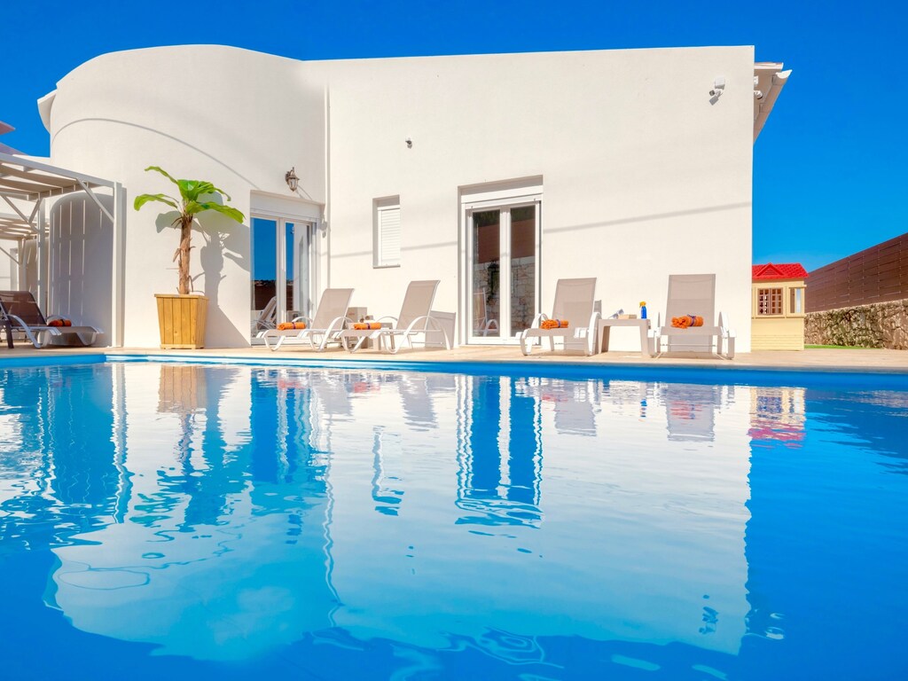 Villa aan het strand met privézwembad
