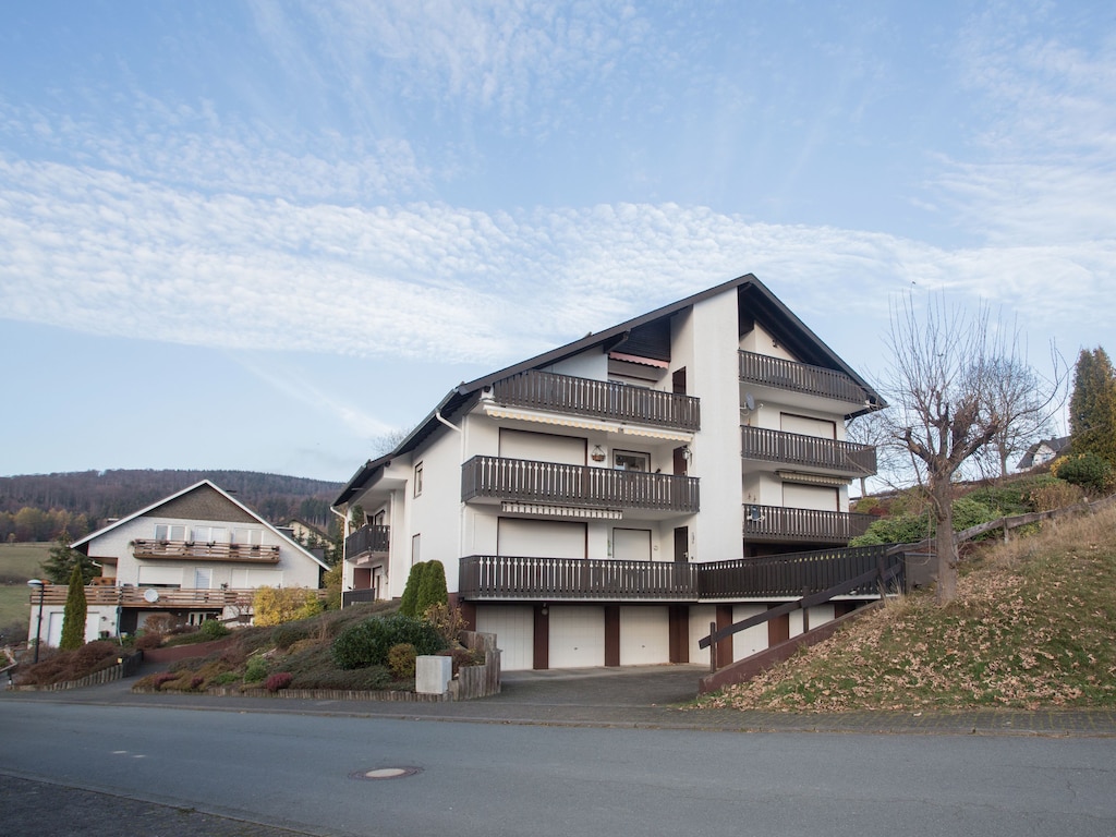 Appartement met balkon en garage