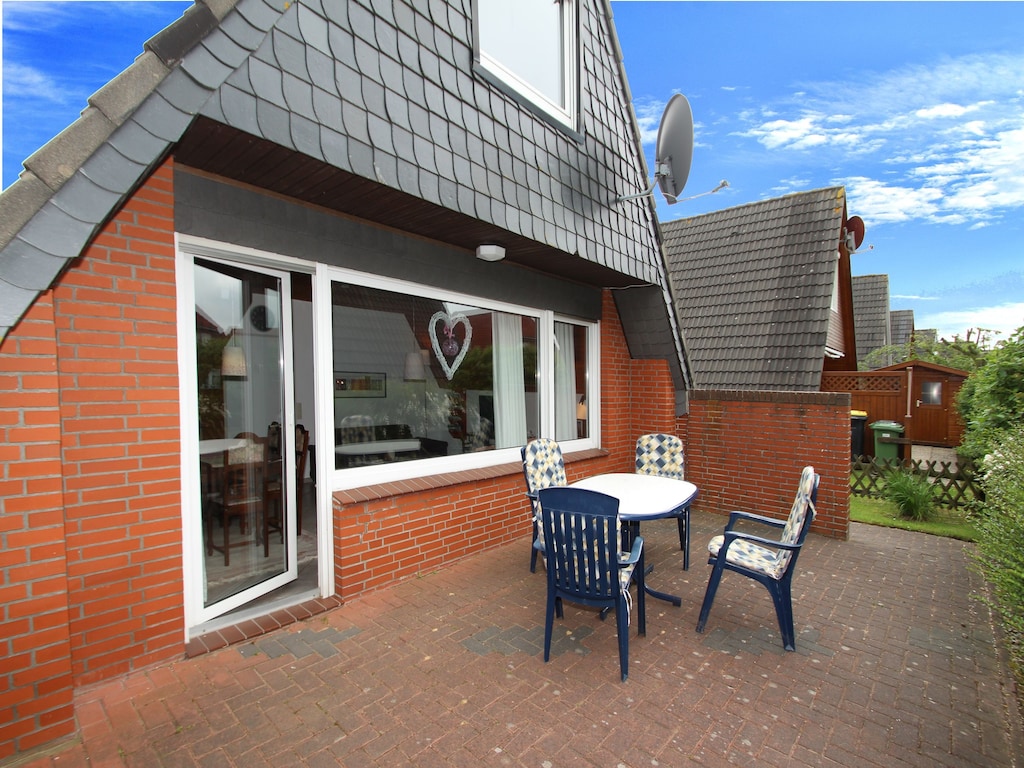 Vakantiehuis Toms Hutte met terras in Dornum