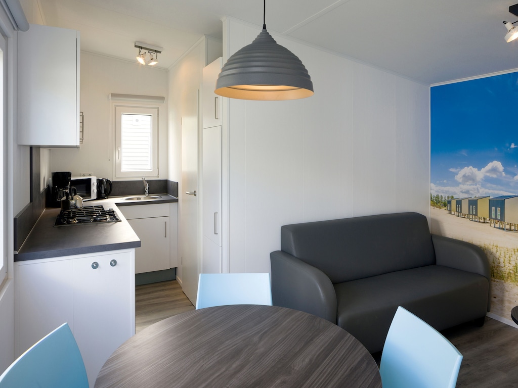 Fijn chalet met magnetron, strand op loopafstand