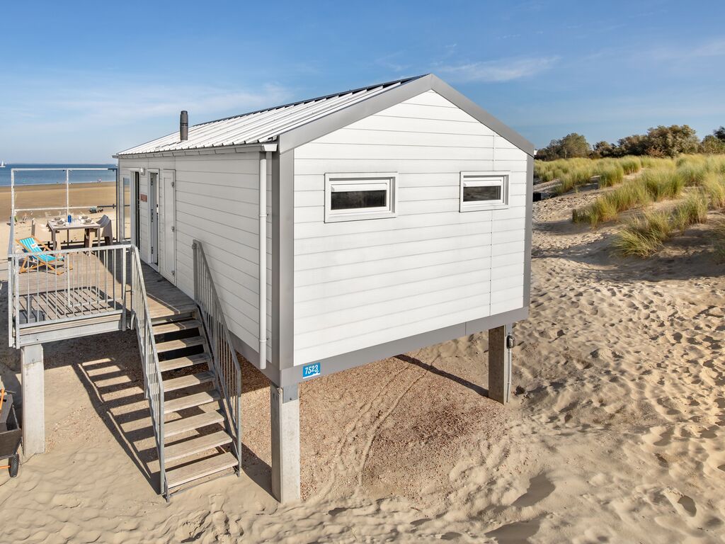 Uniek strandhuis met afwasmachine, op toplocatie