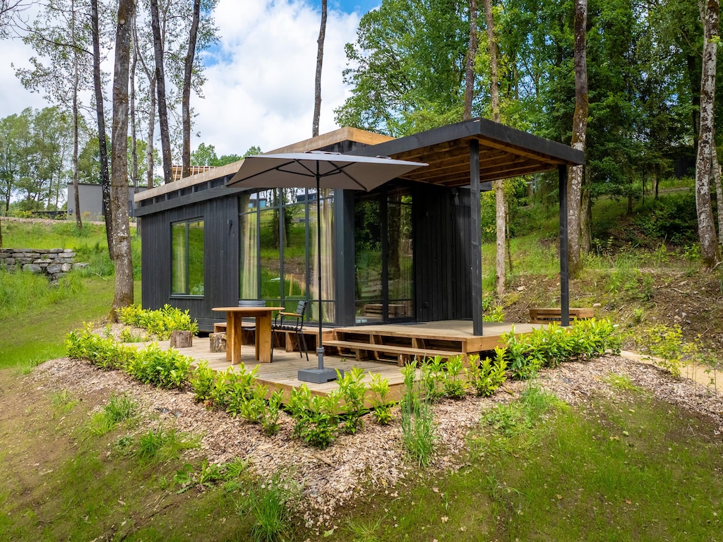 Nice lodge with a view on a natural resort